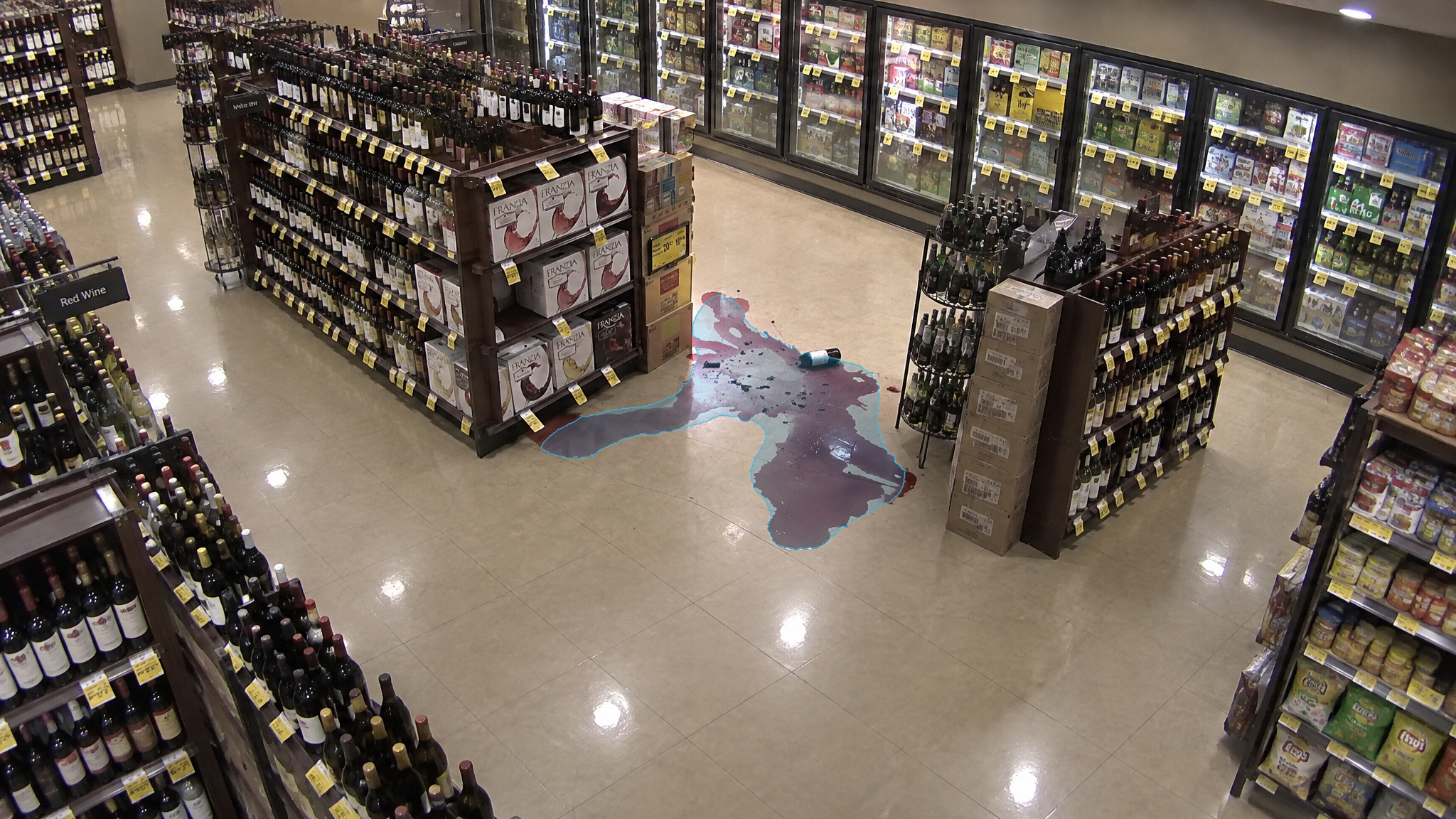 Real V4 detection, processed live: Retail store, puddle detected. Overlay output of VisionAery Liquid Leak Detection.